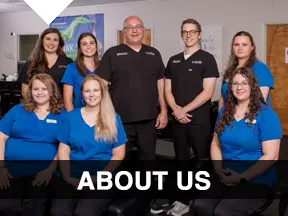 Chiropractor Anderson SC Clay Wickiser With Team